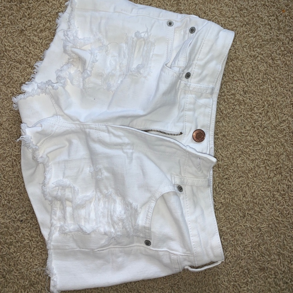 White ripped American Eagle shorts